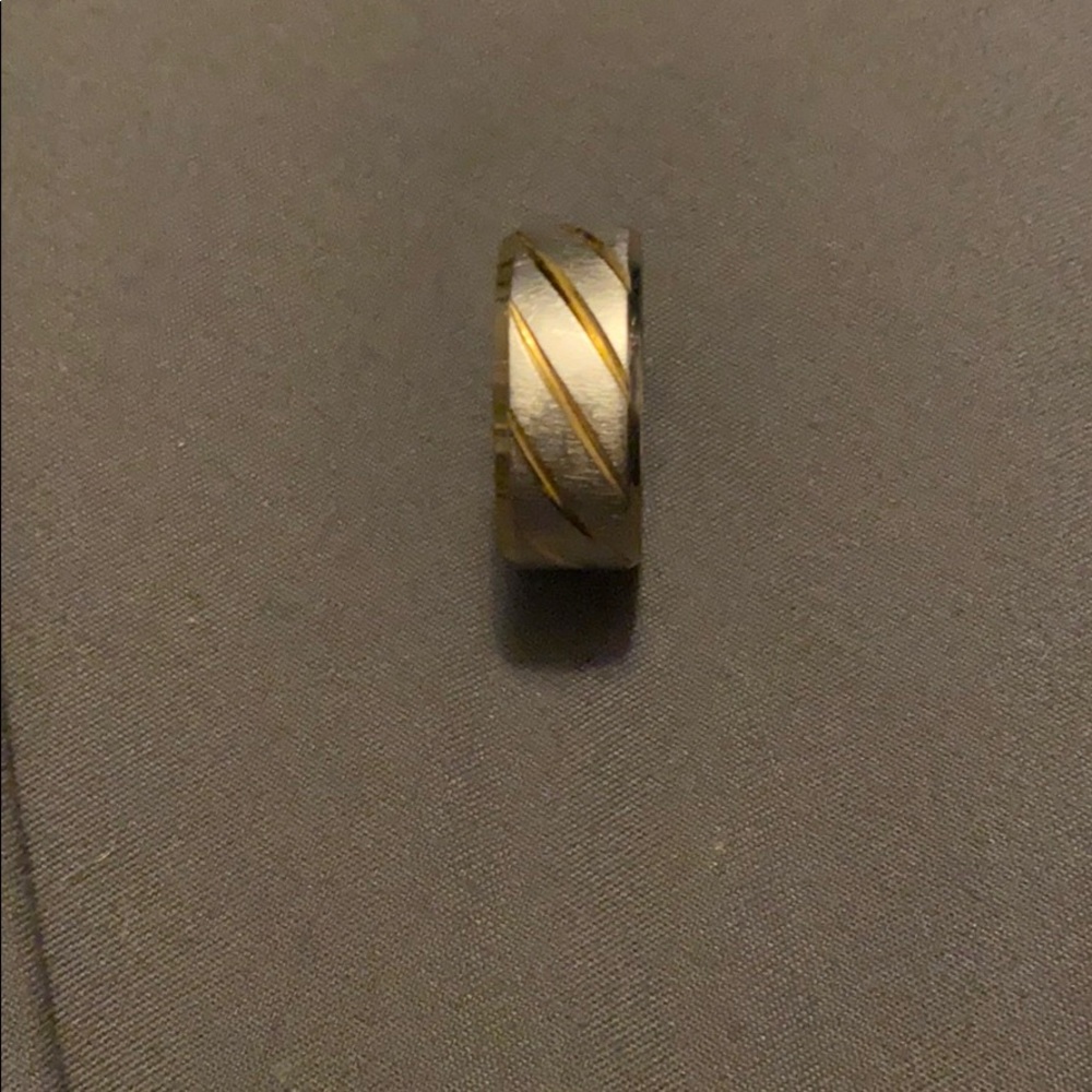 Men’s silver and gold ring